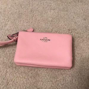 Light pink coach wristlet